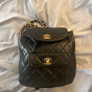 CHANEL Black Quilted Leather Backpack with Gold-Tone CC Hardware